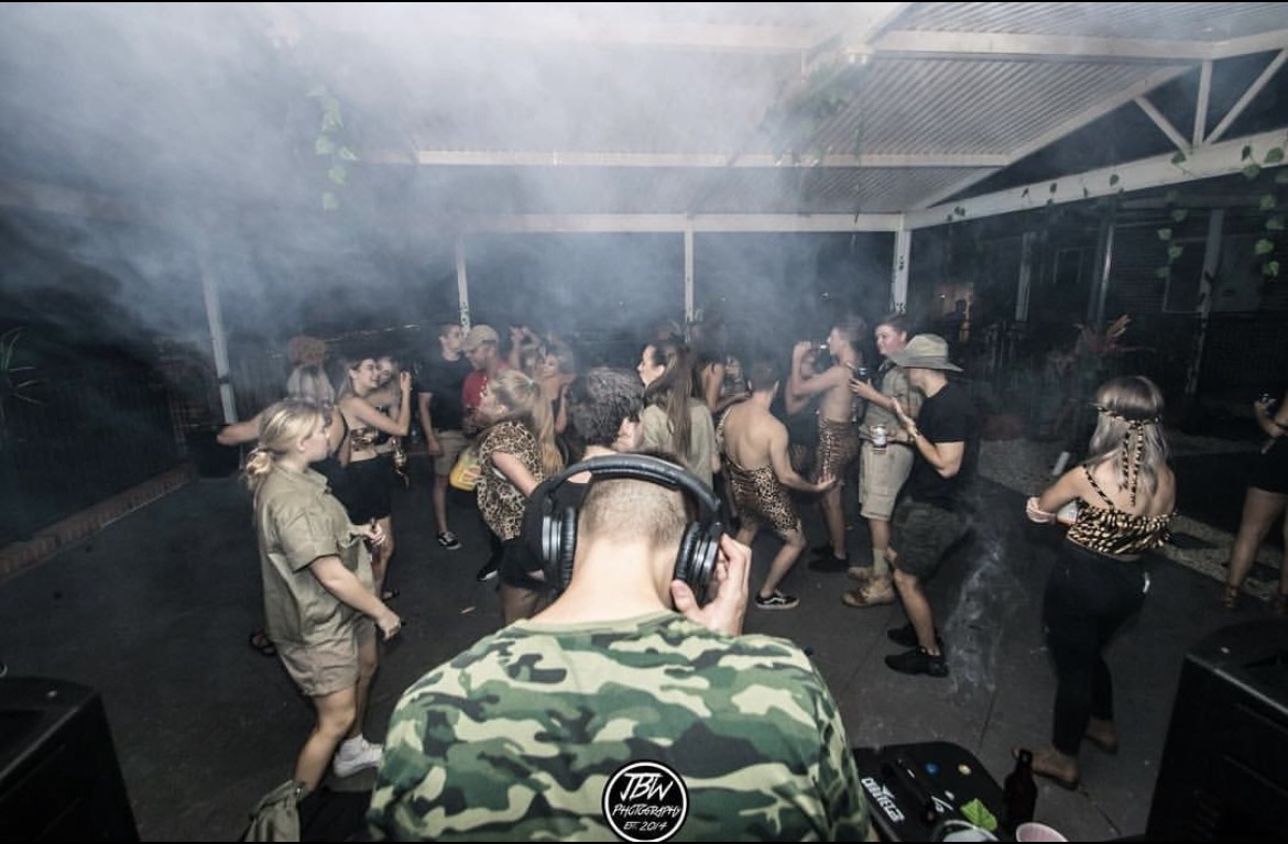 Guests dancing at a themed party